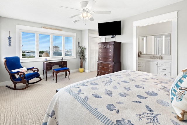 415 Gulf Shore Dr Unit 1, Destin, FL 32541 - carpeted bedroom featuring a ceiling fan and ensuite bathroom