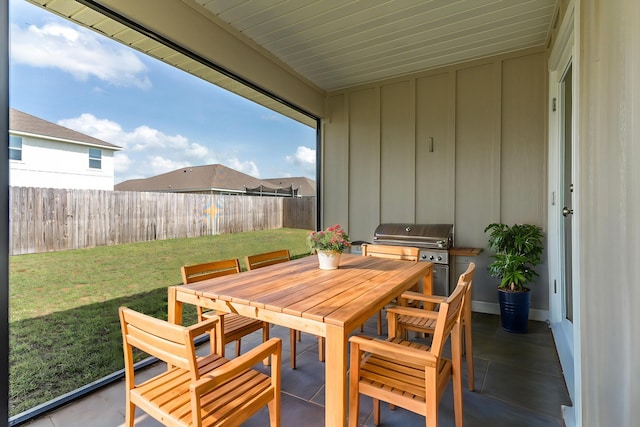 919 Sandbar Loop, Crestview, FL 32539 - fenced backyard with grilling area, a patio area, and outdoor dining space