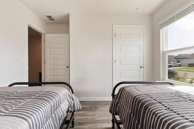 919 Sandbar Loop, Crestview, FL 32539 - bedroom with wood finished floors and baseboards