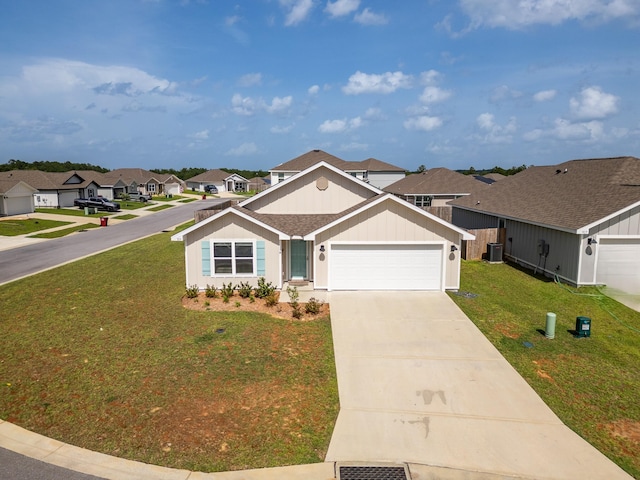 919 Sandbar Loop, Crestview, FL 32539 - view of front of home featuring a residential view, an attached garage, a front yard, and concrete driveway