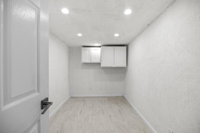 4352 Watkins St, Pace, FL 32571 - basement featuring recessed lighting, a textured wall, and a textured ceiling
