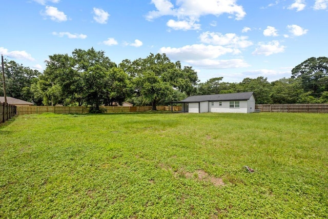 4352 Watkins St, Pace, FL 32571 - fenced backyard with a garage