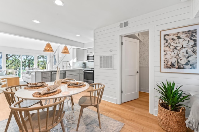 70 N Camp Creek Rd Unit 3, Inlet Beach, FL 32461 - dining area with light wood-style floors, recessed lighting, and wooden walls