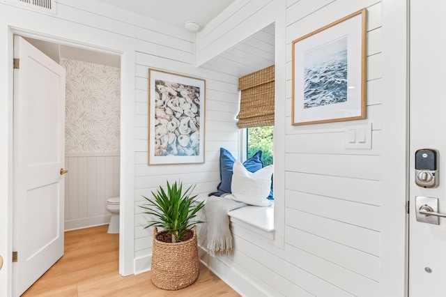 70 N Camp Creek Rd Unit 3, Inlet Beach, FL 32461 - interior space featuring light wood finished floors, wainscoting, and wood walls