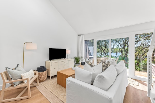 70 N Camp Creek Rd Unit 3, Inlet Beach, FL 32461 - living area with light wood-style floors and high vaulted ceiling