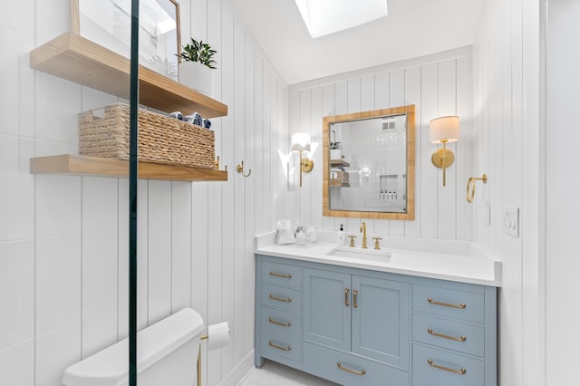 70 N Camp Creek Rd Unit 3, Inlet Beach, FL 32461 - bathroom featuring a skylight and vanity
