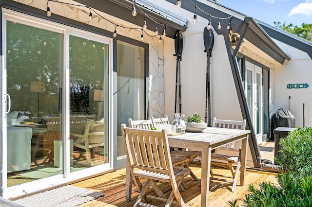 70 N Camp Creek Rd Unit 3, Inlet Beach, FL 32461 - wooden terrace with outdoor dining space