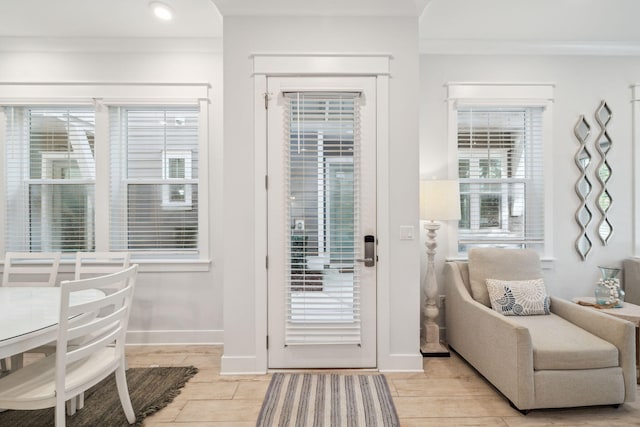 309 Milestone Dr Unit A, Inlet Beach, FL 32461 - entryway featuring light wood finished floors and crown molding
