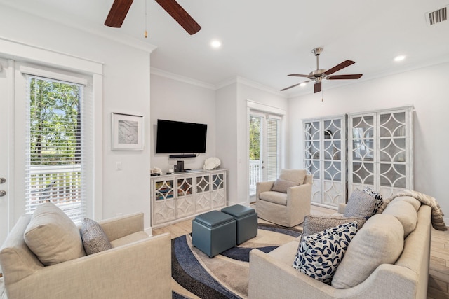 309 Milestone Dr Unit A, Inlet Beach, FL 32461 - living room featuring a ceiling fan, recessed lighting, wood finished floors, and crown molding