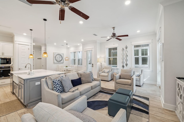 309 Milestone Dr Unit A, Inlet Beach, FL 32461 - living room with a ceiling fan, recessed lighting, plenty of natural light, ornamental molding, and light wood-style floors