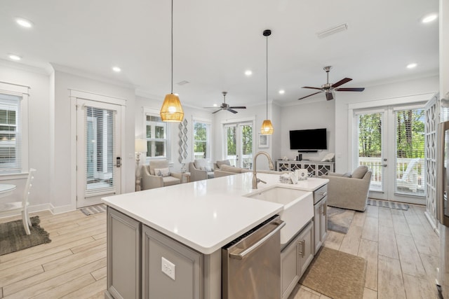 309 Milestone Dr Unit A, Inlet Beach, FL 32461 - kitchen featuring dishwasher, open floor plan, light wood-style floors, crown molding, and gray cabinetry
