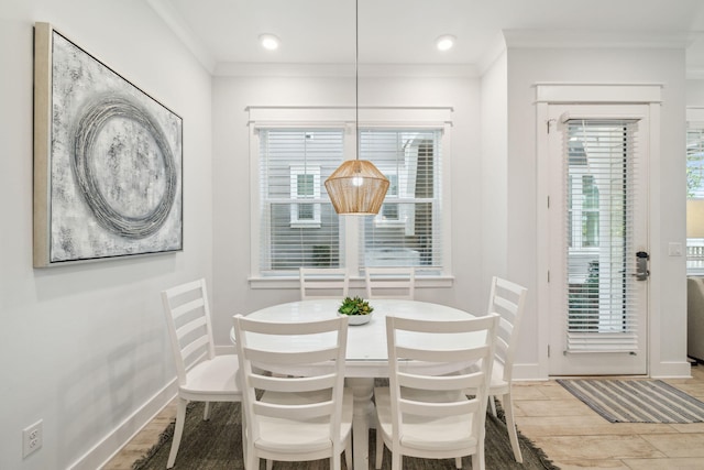 309 Milestone Dr Unit A, Inlet Beach, FL 32461 - dining room featuring light wood-type flooring and crown molding