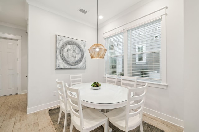 309 Milestone Dr Unit A, Inlet Beach, FL 32461 - dining space with ornamental molding, light wood finished floors, and recessed lighting