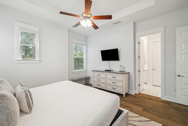 309 Milestone Dr Unit A, Inlet Beach, FL 32461 - bedroom with wood finished floors, a ceiling fan, and ensuite bathroom