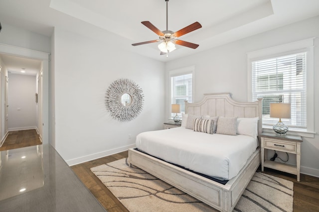 309 Milestone Dr Unit A, Inlet Beach, FL 32461 - bedroom with wood finished floors, a raised ceiling, and ceiling fan