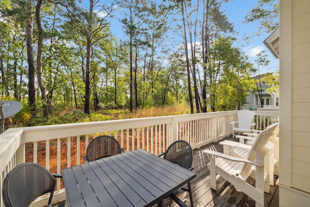 309 Milestone Dr Unit A, Inlet Beach, FL 32461 - wooden terrace with outdoor dining area
