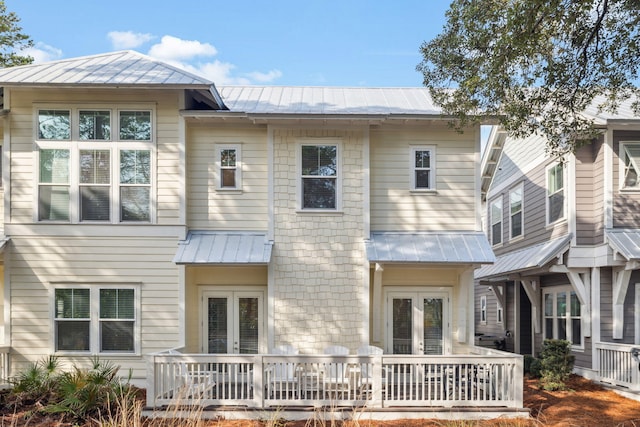 309 Milestone Dr Unit A, Inlet Beach, FL 32461 - back of property featuring french doors, a metal roof, and a standing seam roof