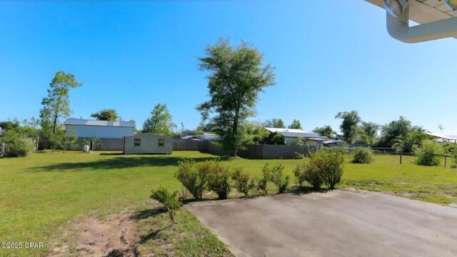 7202 Ranier St, Panama City, FL 32404 - view of yard featuring a storage unit