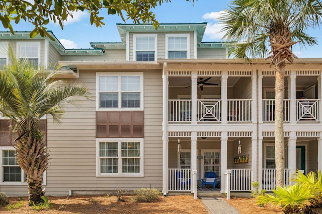 104 Village Blvd Apt 615, Santa Rosa Beach, FL 32459 - back of house with a balcony, a ceiling fan, and a porch