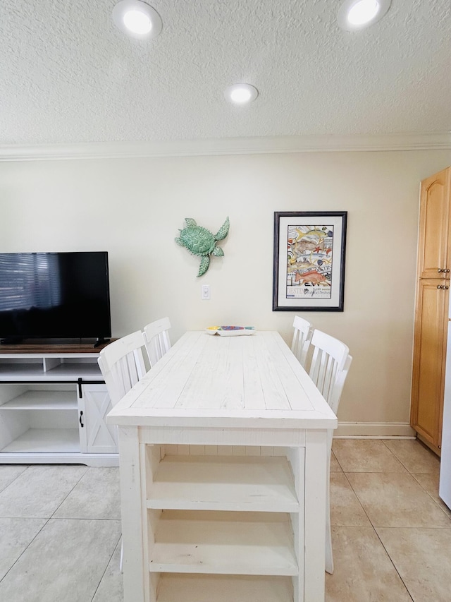3100 Scenic Highway 98 Unit 118, Destin, FL 32541 - dining area featuring light tile patterned floors, ornamental molding, a textured ceiling, and recessed lighting