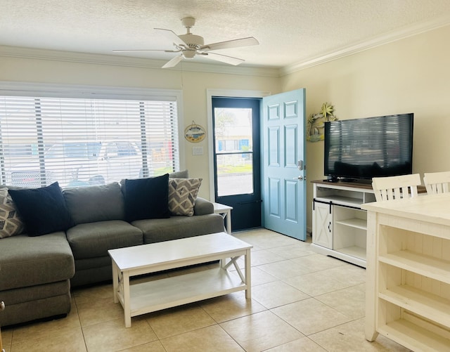 3100 Scenic Highway 98 Unit 118, Destin, FL 32541 - living room featuring ornamental molding, a textured ceiling, light tile patterned floors, and ceiling fan