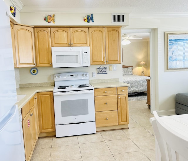 3100 Scenic Highway 98 Unit 118, Destin, FL 32541 - kitchen featuring white appliances, ornamental molding, light brown cabinets, and light countertops