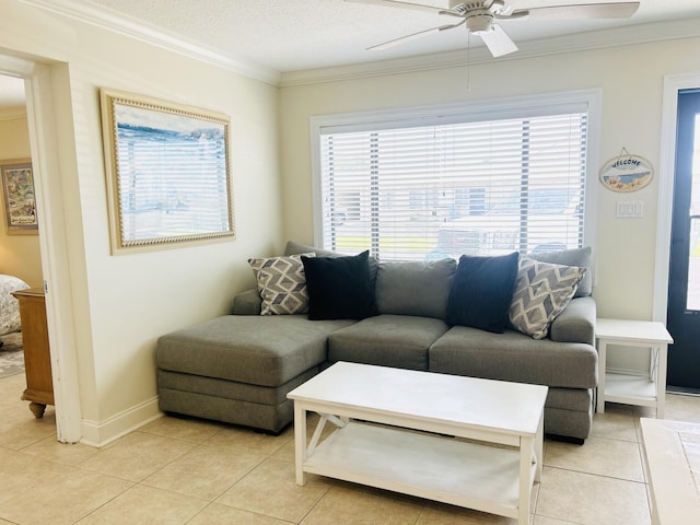 3100 Scenic Highway 98 Unit 118, Destin, FL 32541 - living room featuring ornamental molding, a ceiling fan, and light tile patterned floors