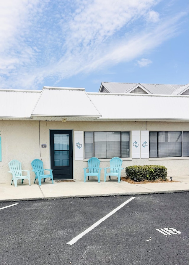 3100 Scenic Highway 98 Unit 118, Destin, FL 32541 - view of property featuring uncovered parking