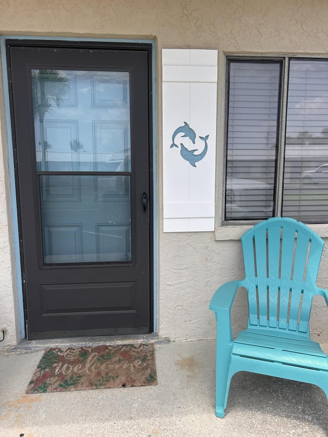 3100 Scenic Highway 98 Unit 118, Destin, FL 32541 - property entrance featuring stucco siding
