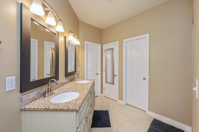 4530 Annabelle Ln, Crestview, FL 32539 - bathroom featuring double vanity and tile patterned floors