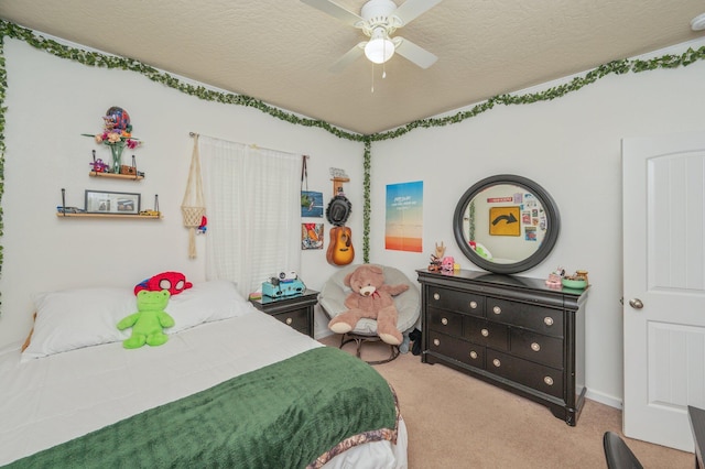 4530 Annabelle Ln, Crestview, FL 32539 - carpeted bedroom with a textured ceiling and a ceiling fan