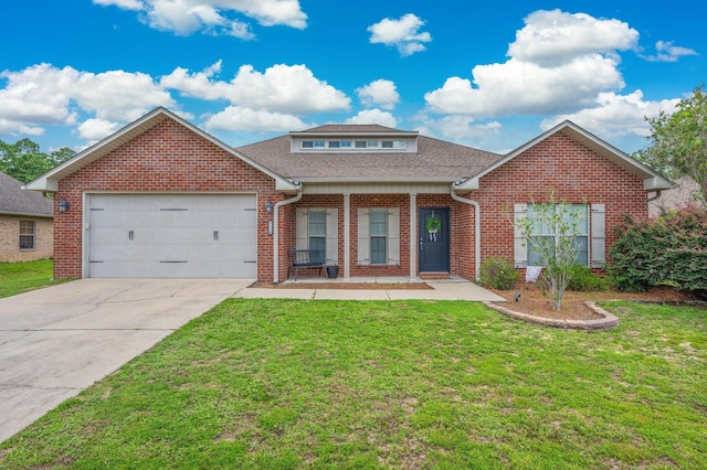 4530 Annabelle Ln, Crestview, FL 32539 - view of front facade featuring brick siding, an attached garage, covered porch, a front lawn, and roof with shingles