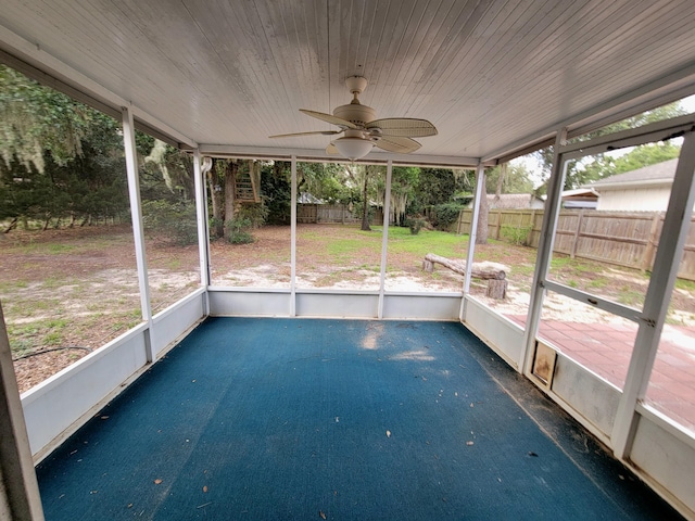 6868 E Bay Blvd, Navarre, FL 32566 - unfurnished sunroom featuring ceiling fan
