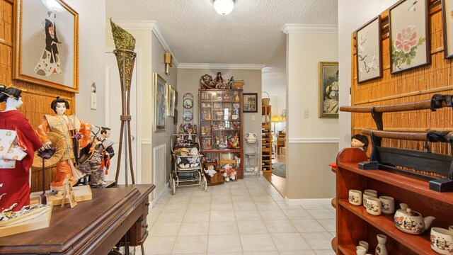 4936 Grassy Pond Rd, Chipley, FL 32428 - corridor featuring a textured ceiling, light tile patterned floors, ornamental molding, and wooden walls