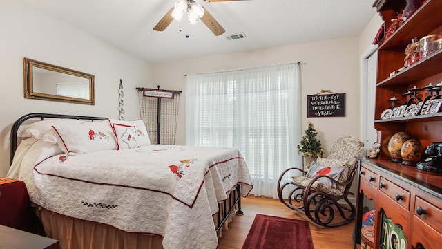 4936 Grassy Pond Rd, Chipley, FL 32428 - bedroom featuring wood finished floors and a ceiling fan