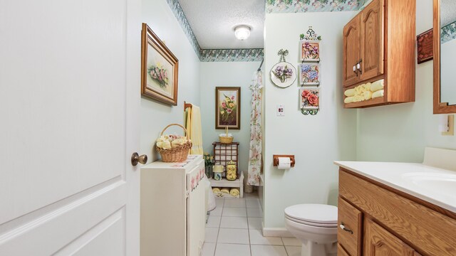 4936 Grassy Pond Rd, Chipley, FL 32428 - bathroom featuring vanity, tile patterned floors, a textured ceiling, and a shower with curtain