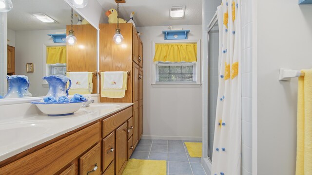 4936 Grassy Pond Rd, Chipley, FL 32428 - bathroom with double vanity, a stall shower, and tile patterned floors