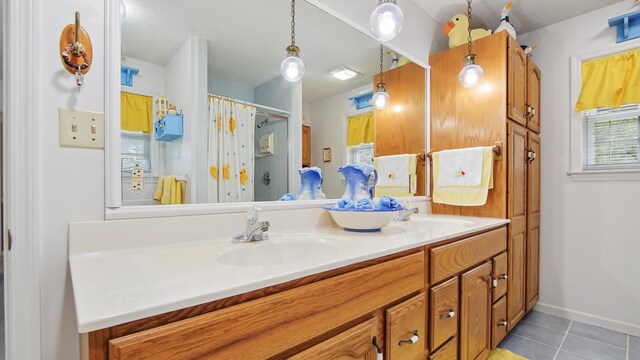 4936 Grassy Pond Rd, Chipley, FL 32428 - full bathroom with double vanity, tile patterned flooring, and a shower with shower curtain