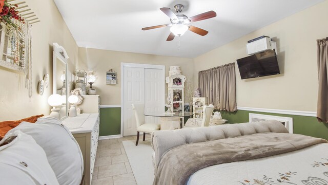 4936 Grassy Pond Rd, Chipley, FL 32428 - bedroom featuring a closet, ceiling fan, and light tile patterned floors