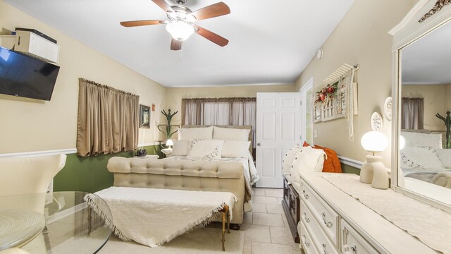 4936 Grassy Pond Rd, Chipley, FL 32428 - bedroom featuring light tile patterned floors and a ceiling fan