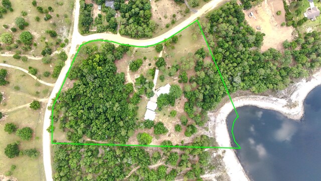 4936 Grassy Pond Rd, Chipley, FL 32428 - aerial view of property and surrounding area with a large body of water and property boundaries highlighted