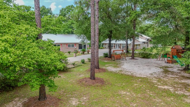 4936 Grassy Pond Rd, Chipley, FL 32428 - view of yard with a playground