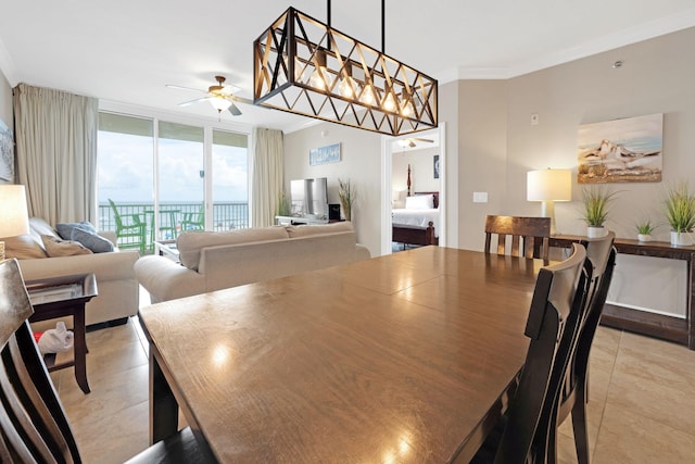 1150 Santa Rosa Blvd Unit 317, Fort Walton Beach, FL 32548 - dining space with light tile patterned flooring, a ceiling fan, ornamental molding, and expansive windows