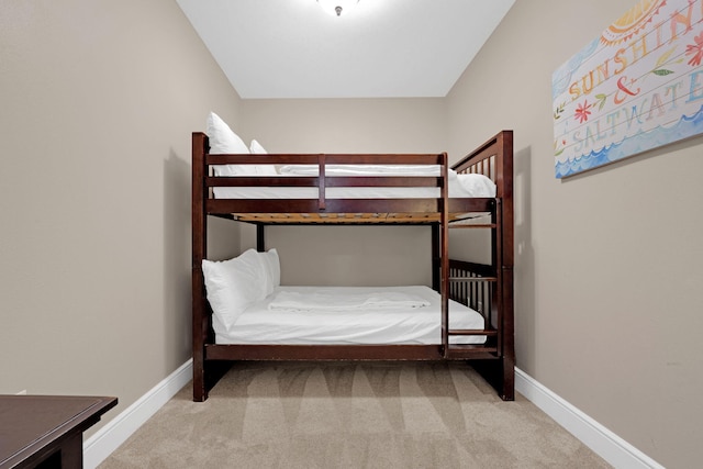 1150 Santa Rosa Blvd Unit 317, Fort Walton Beach, FL 32548 - carpeted bedroom featuring baseboards