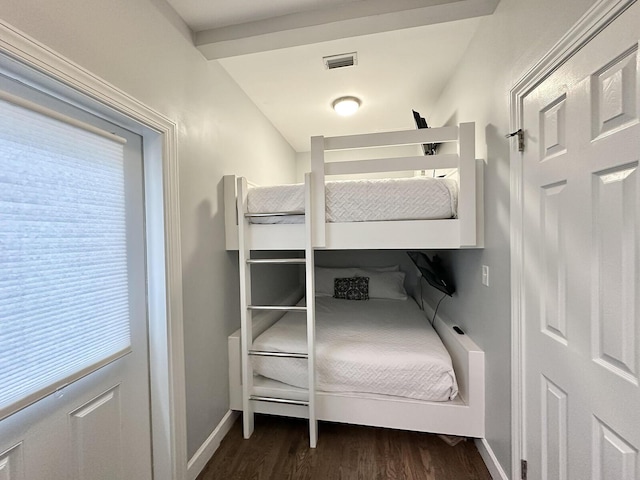 83 Sunfish St, Destin, FL 32541 - bedroom with dark wood-style floors and multiple windows