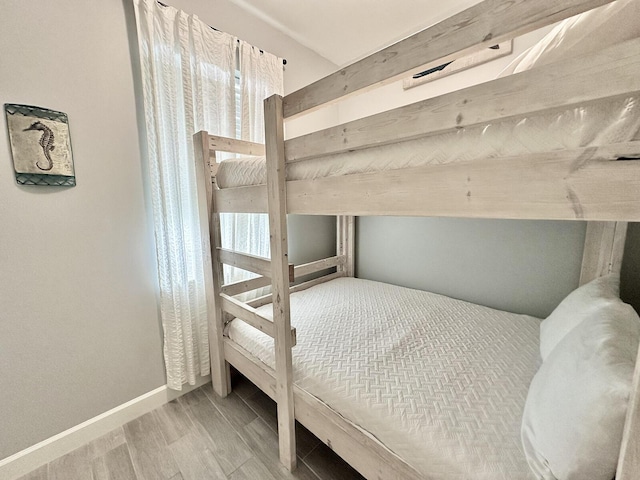 83 Sunfish St, Destin, FL 32541 - bedroom with wood finished floors and baseboards