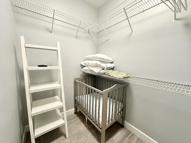 83 Sunfish St, Destin, FL 32541 - walk in closet with wood finished floors