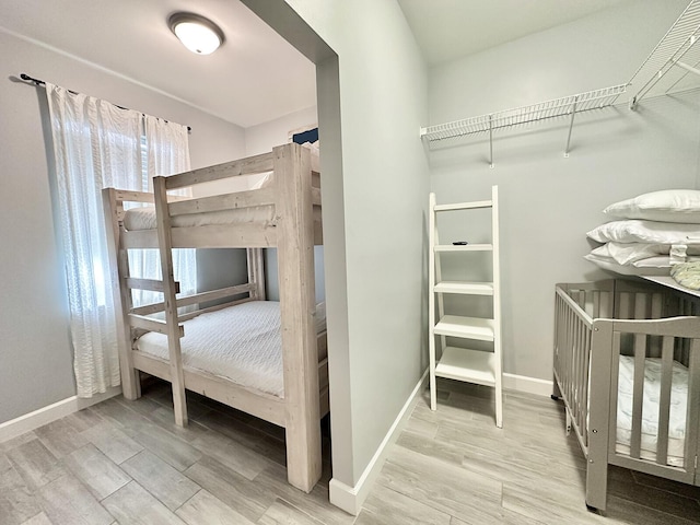 83 Sunfish St, Destin, FL 32541 - bedroom with wood finished floors and baseboards