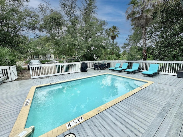 83 Sunfish St, Destin, FL 32541 - swimming pool featuring a deck and an outdoor living space