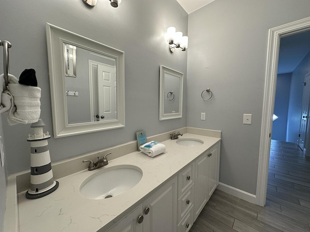 83 Sunfish St, Destin, FL 32541 - bathroom with double vanity and wood finished floors